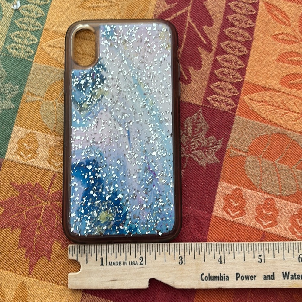 Blue and pink sparkly phone case. Was on iPhone XR.